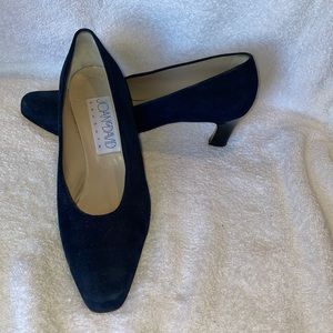 Joan and David Couture navy suede pumps with wood heel.